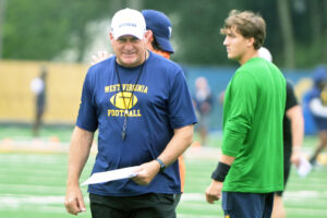 Rich Rodriguez demands toughness at WVU, says his players are too 'soft'